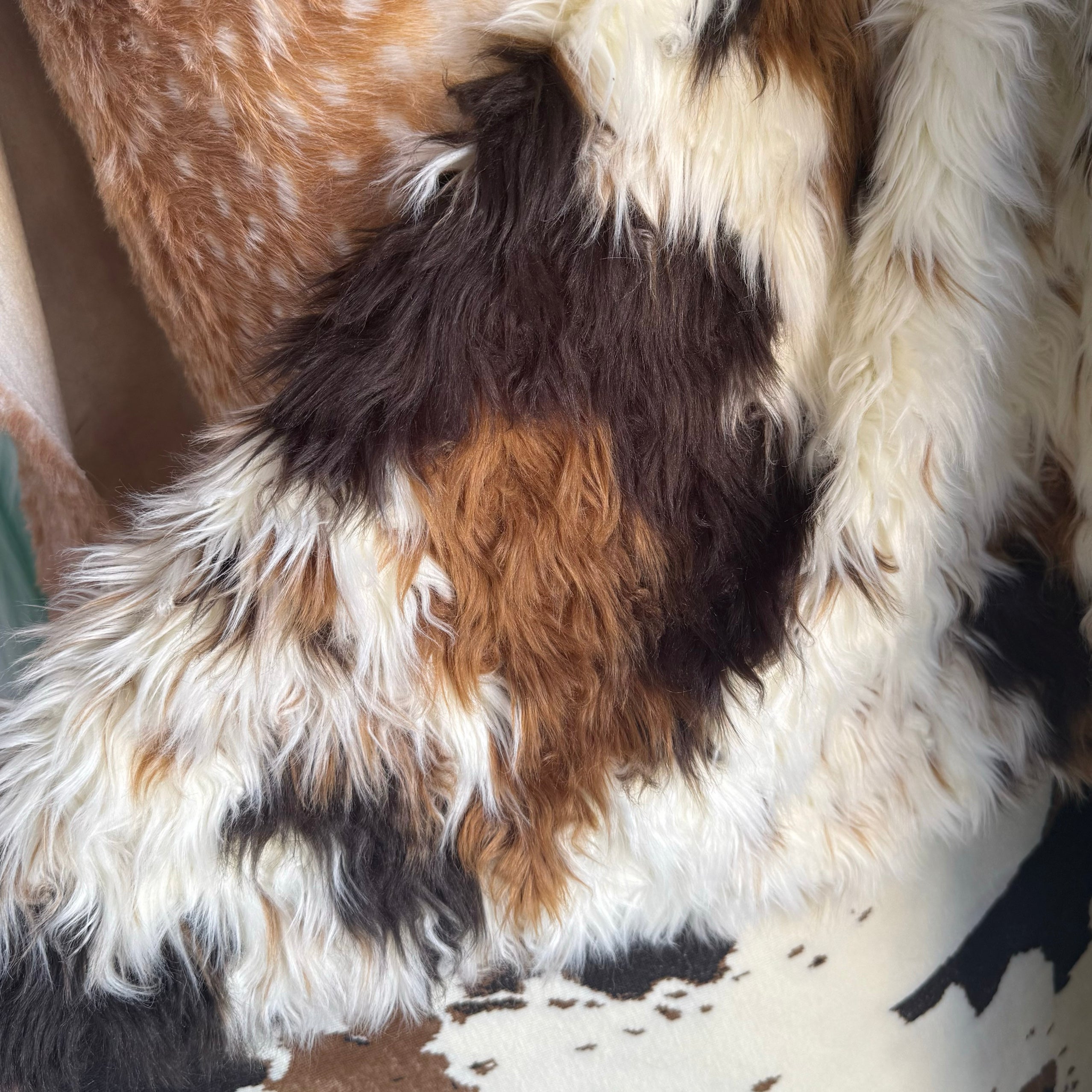 Twisted Long Pile Cow-Print Faux Fur