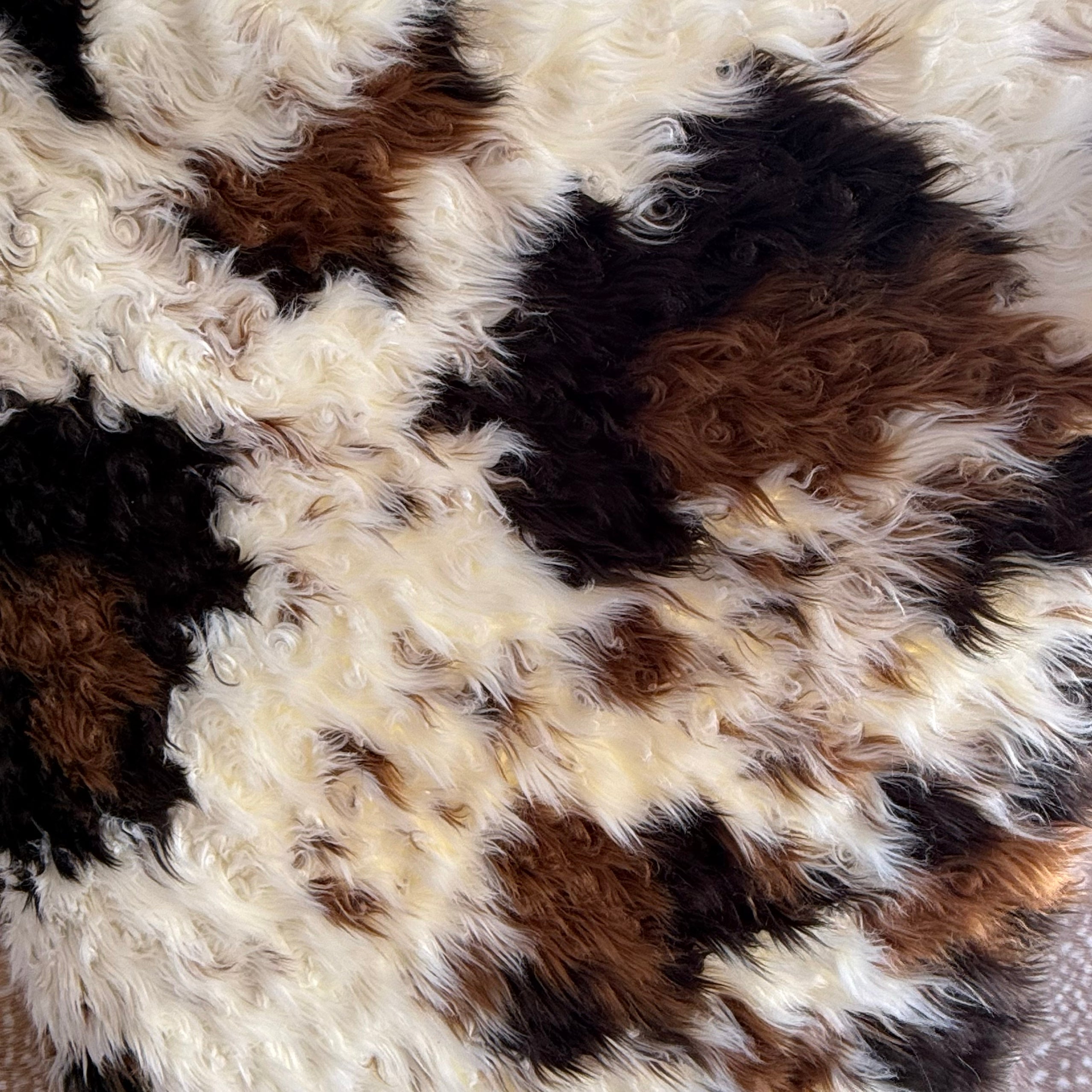 Twisted Long Pile Cow-Print Faux Fur