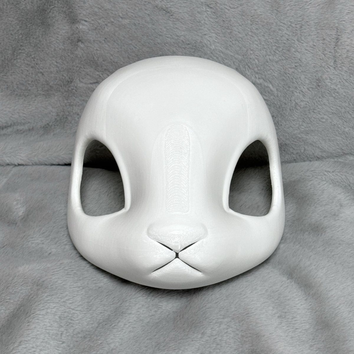 Semi-realistic animal skulls: rabbit, deer, and lamb skulls